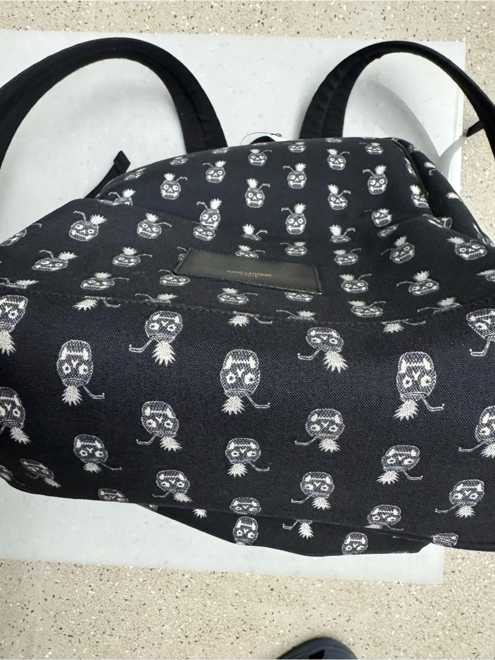 Saint Laurent Black Canvas Backpack with White Pineapple Skull Motif